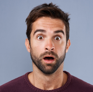 a man has a surprised look on his face once he has learned the truth about testosterone myths.
